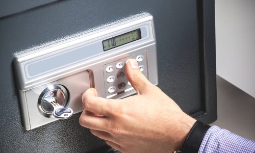 hand opened a safe, close up